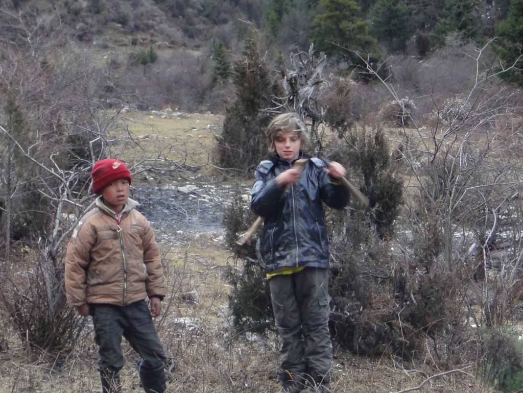 Z and local boy hacking wood in Songpan.