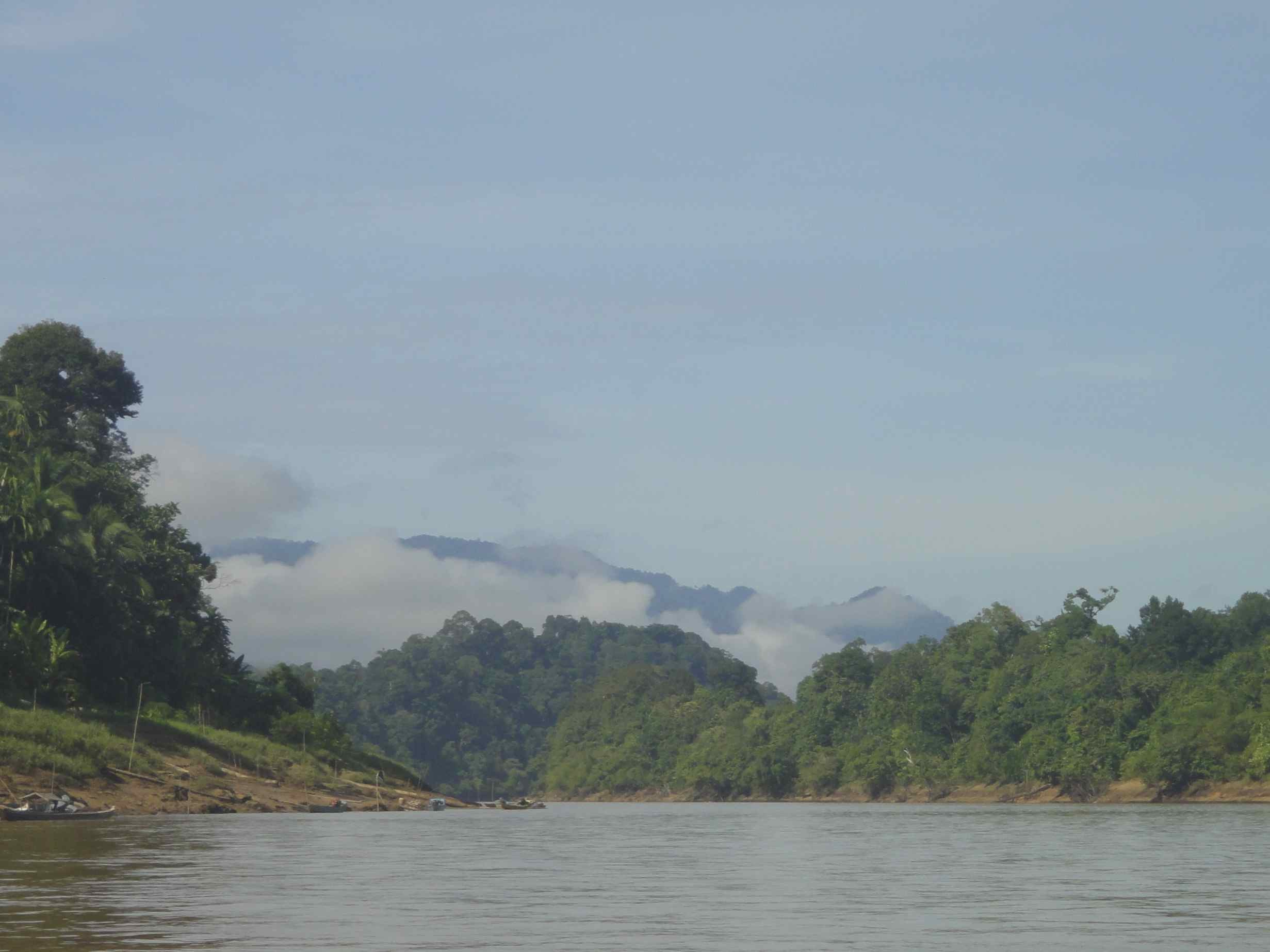 Balui_River_View_Sarawak_Borneo view up the Balui River, Sarawak, Borneo, Malaysia, with clouded hills, smooth water and forest descending to the river.