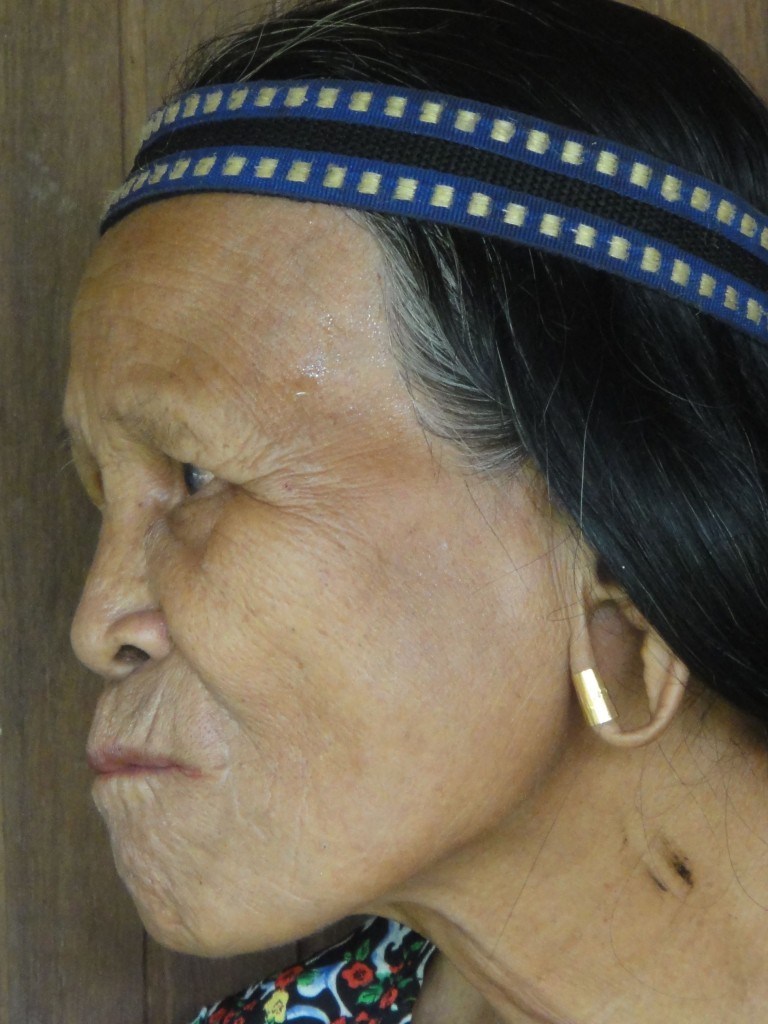 Kayan woman, Borneo