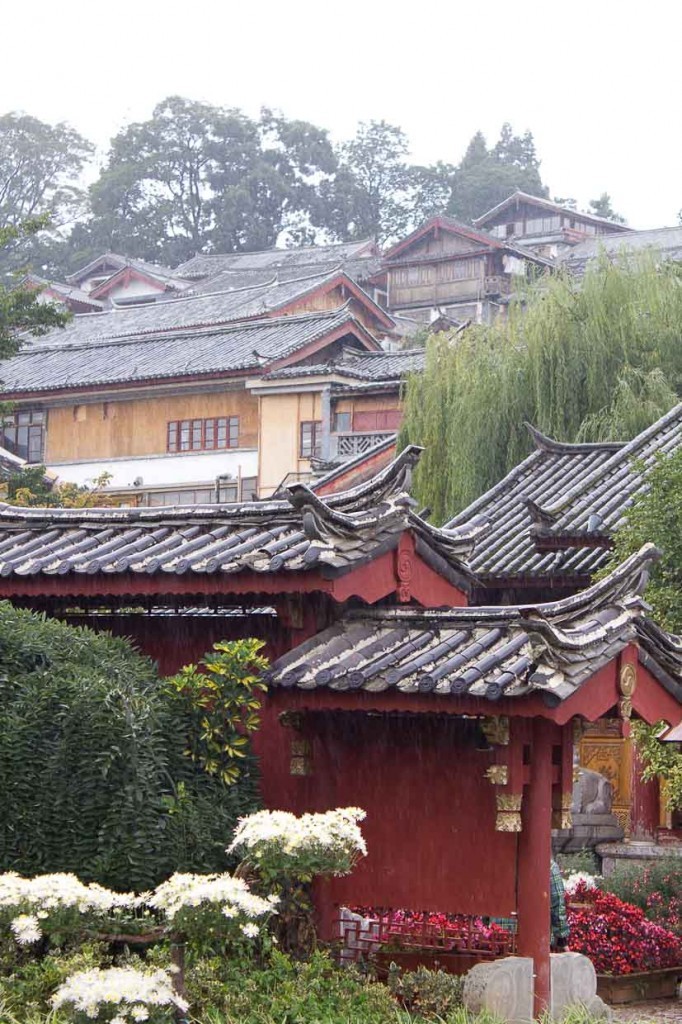 Rooftops rising up the hill in Lijiang Old Town.