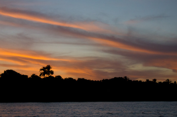 Nile Sunset Sun setting over the east bank of the Nile from a felucca.