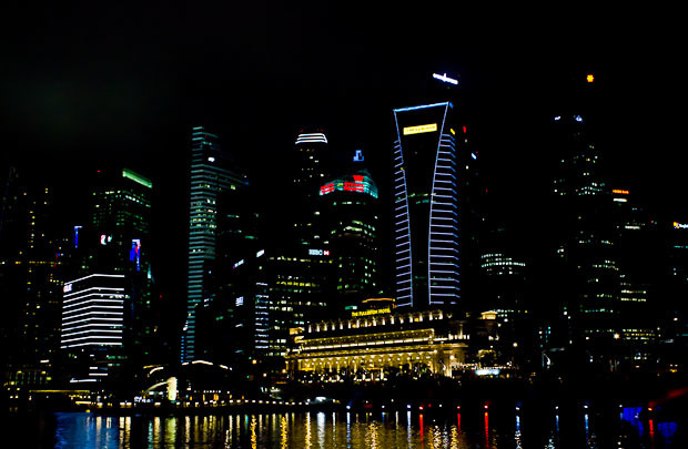 Singapore Skyline by night Skyline on Marina Bay, Singapore, by night, with Fullerton Hotel illuminated.