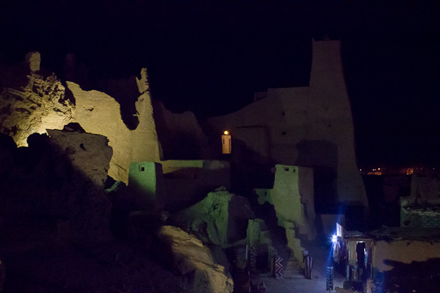 Siwa- Mudbrick fort by night View of the mudbrick fort in Siwa, Egypt, illuminated at night.