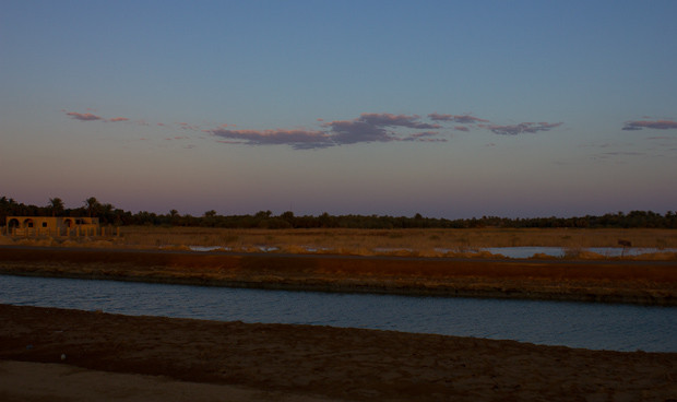 Siwa- canals and salt lakes A canal by a salt lake at twilight on the outskirts of Siwa.