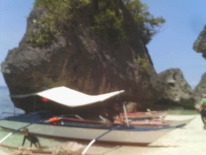 Banca (outrigger) moored on beach, Gaspar Island, Marinduque, Philippines