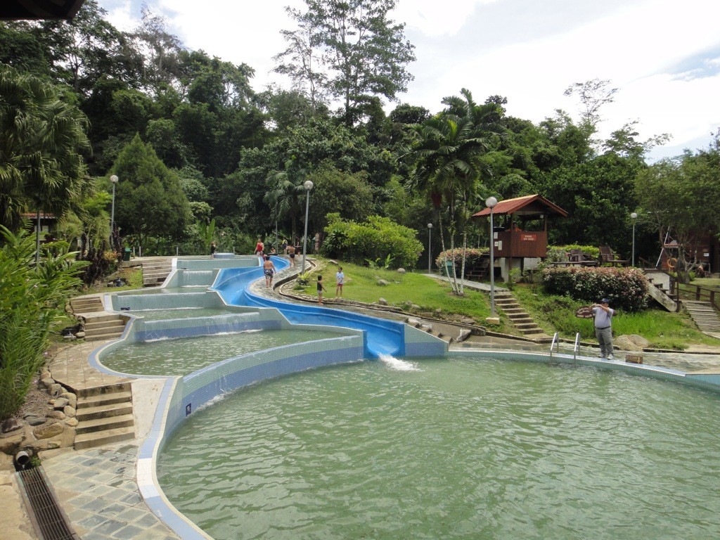 DSC03719 stepped pools and waterslide against verdant backdrop of lowland forest. Poring Hot Springs, Kinabalu Park, Borneo, Malaysia.