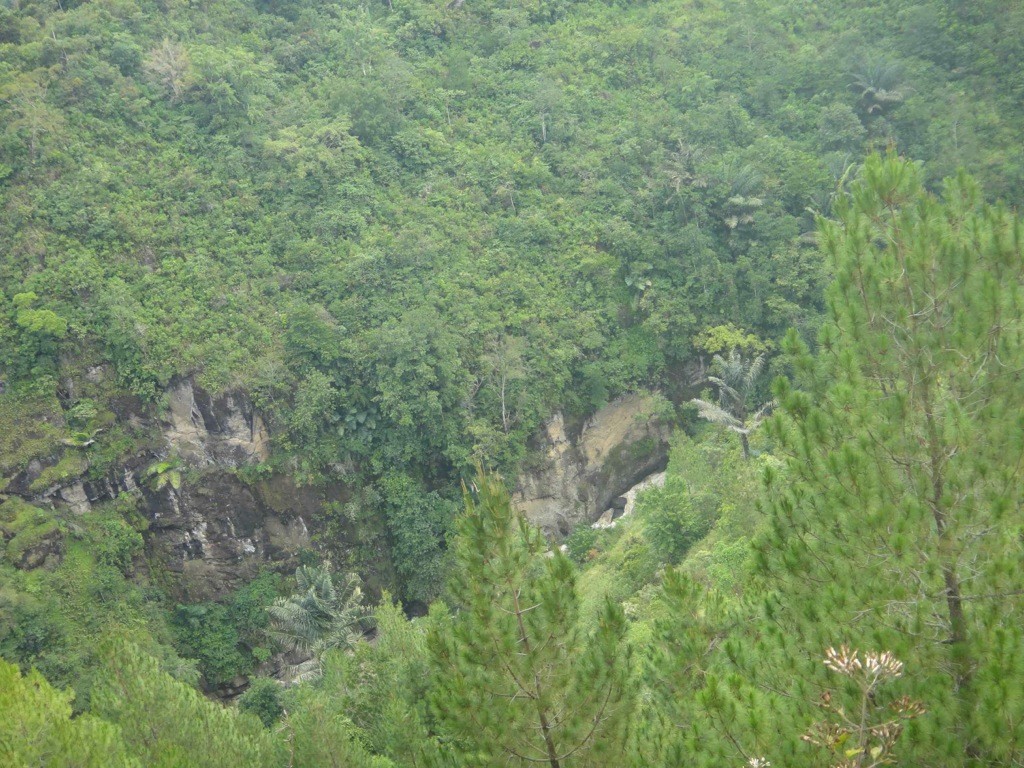 first sight of maiting river, tana toraja, sulawesi, indonesia Our first sight of the Maiting River, appearing at the bottom of the forested gorge. Tana Toraja, Sulawesi, Indonesia.
