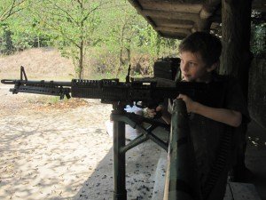 Z takes aim with an M60, Cu Chi Tunnels