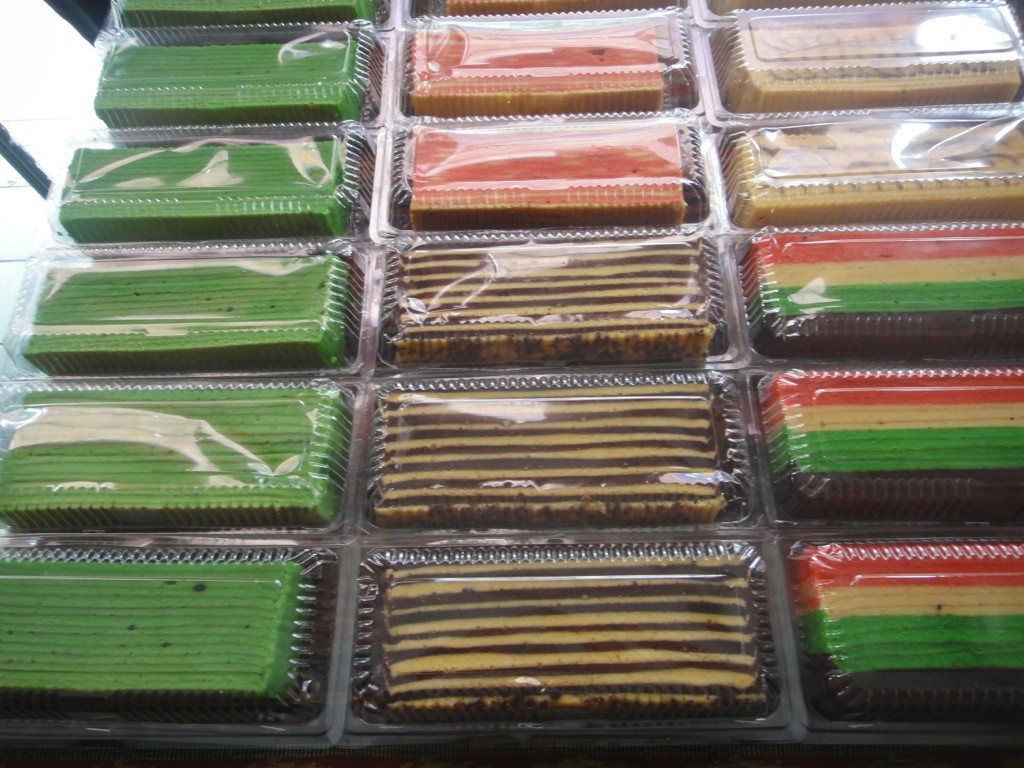 stripy-borneo-cakes Brightly coloured stripey cakes for sale in Borneo.