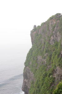 ulu watu cliffs meru multi-roofed temple on the cliffs of ulu watu, south bali.