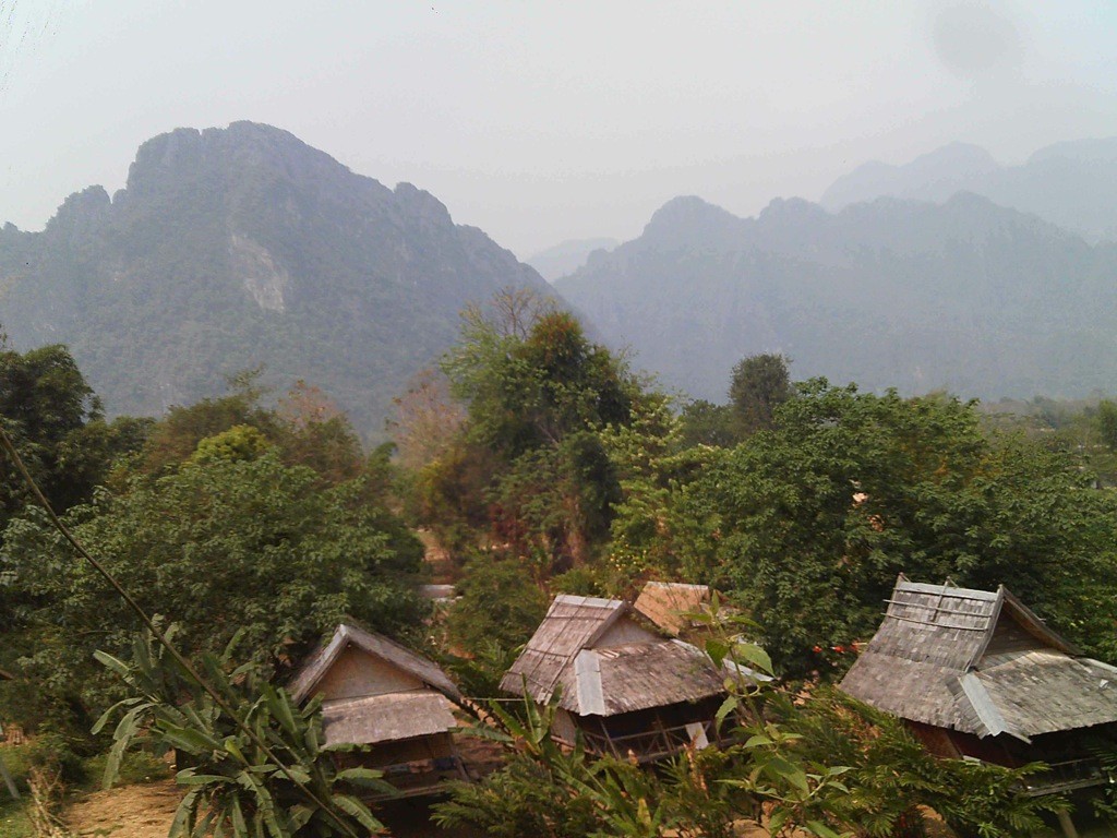 Vang-Vieng-Laos View of huts and karsts, Vang Vieng, Laos