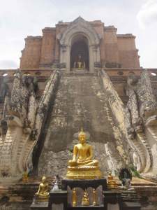 Buddhas on the ruins of a medieval chedi. Wat Chedi Luang, Chiang Mai, Thailand.