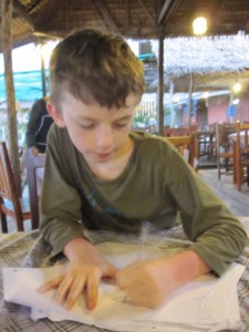 Z studying at a seafood restaurant on Bang Bao pier