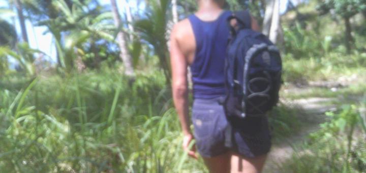 Me from behind, walking through coconut forest, Mariquit, Palawan, Philippines