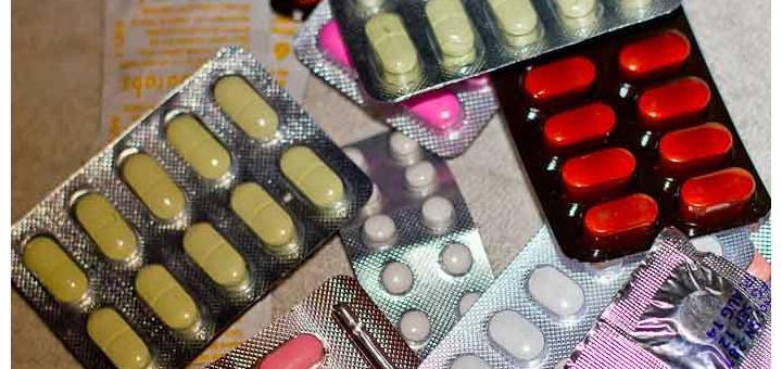 Blister packs of brightly coloured medicines.