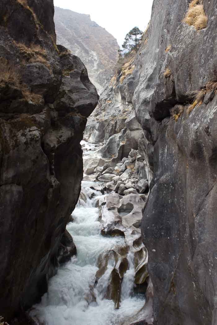 Everest Base Camp: narrow waterfall series near Thame.