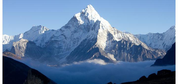 Everest Base Camp trek - Ama Dablam seen from Dzonghla, surrounded by mist.