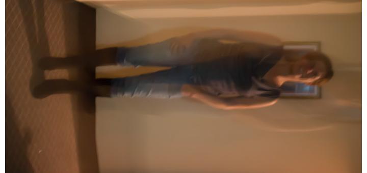 Blurry sideways shot of moi in my kneeboots.