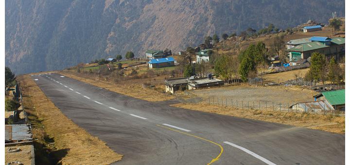 The runway at Lukla airport, dropping off the edge of the valley.