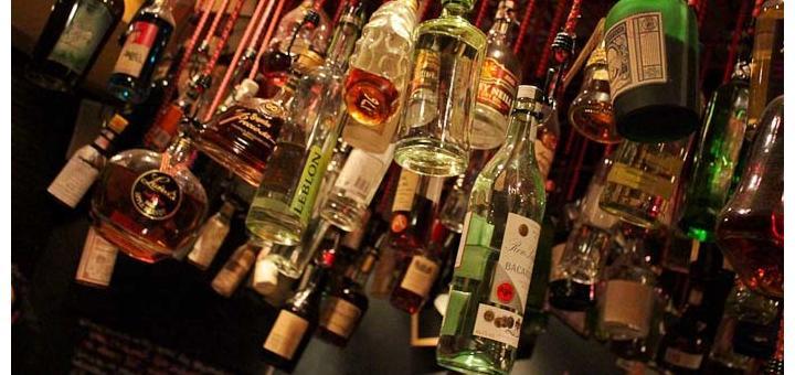 Dangling bottles at Der Raum in Melbourne.