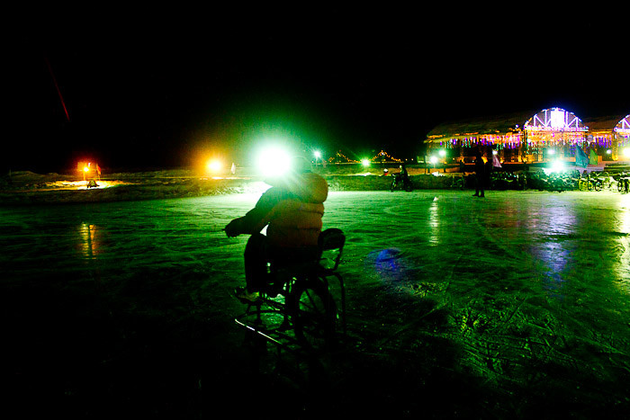 Riding an ice bike at Harbin Snow & Ice World.