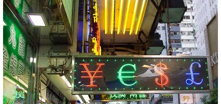 Sign reading YES made with yen, euro and dollar signs - TST, Hong Kong.