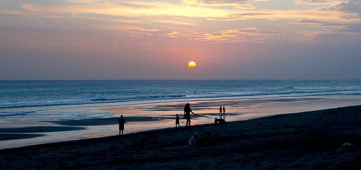 Sunset over Batu Belig beach, Bali.
