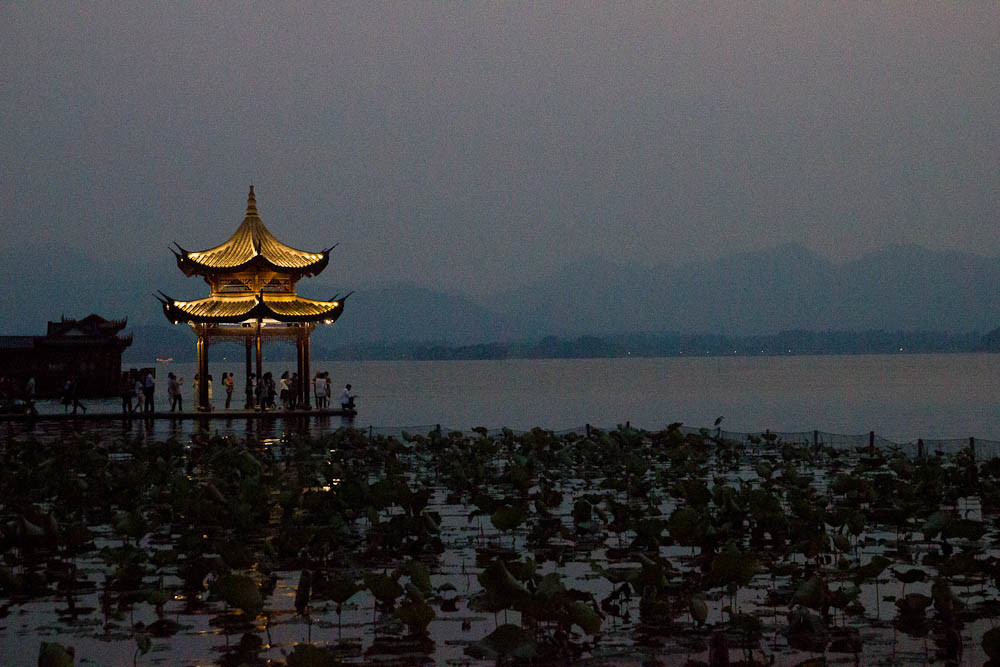 Hangzhou's West Lake by night.