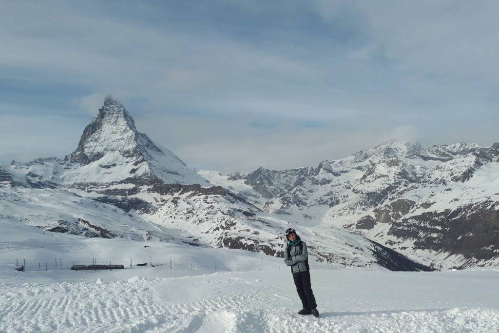 Zach in ski gear by the Matterhorn in the Zermatt-Cervinia ski area